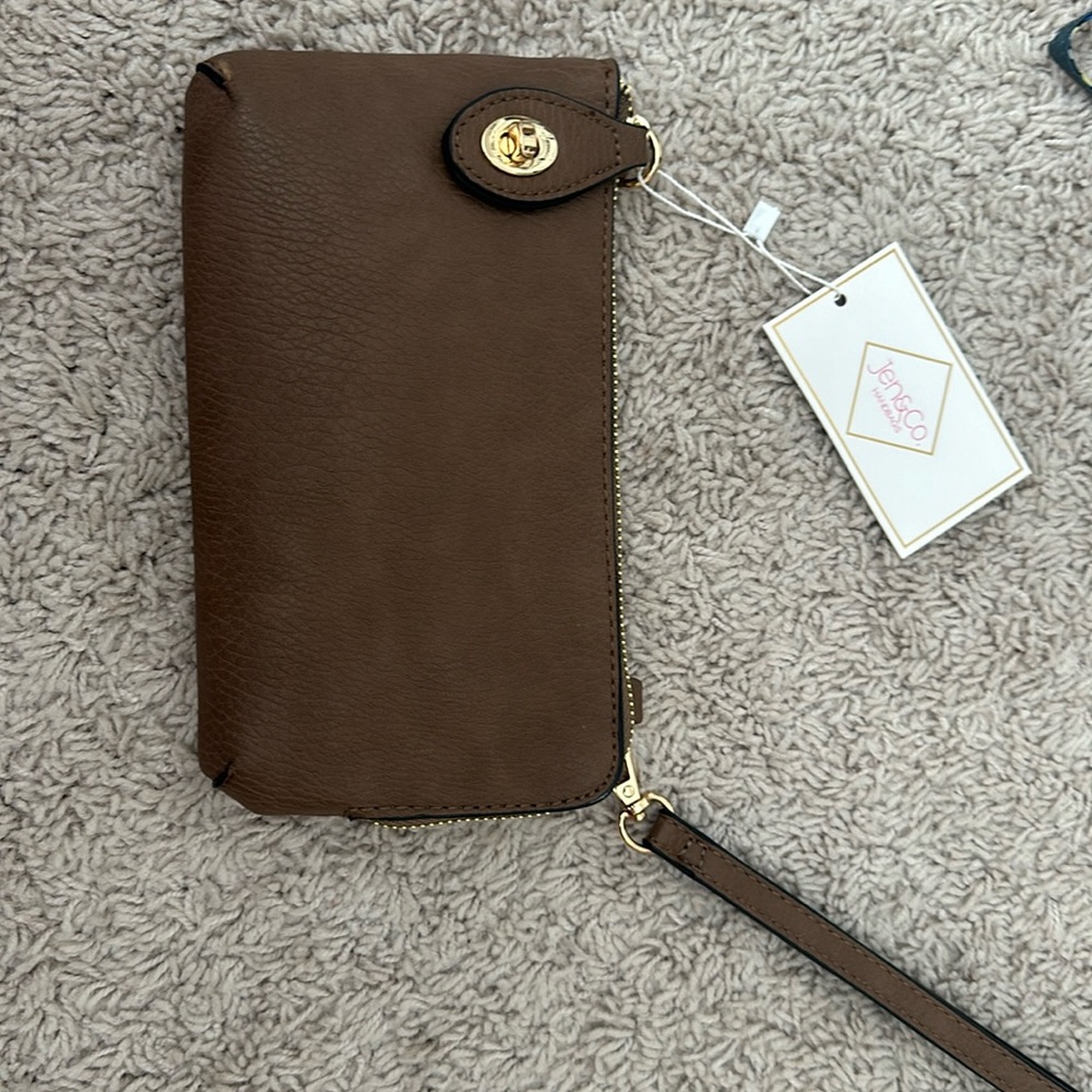 Super cute wristlet or cross body!
